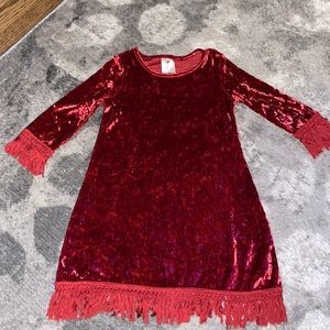 New, Never worn girl’s red velvet 3/4 sleeve dress with fringe hem